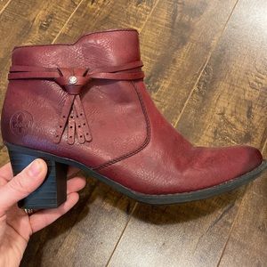 Red Rieker booties.